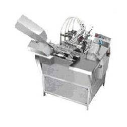 AMPOULE FILLING AND SEALING MACHINE